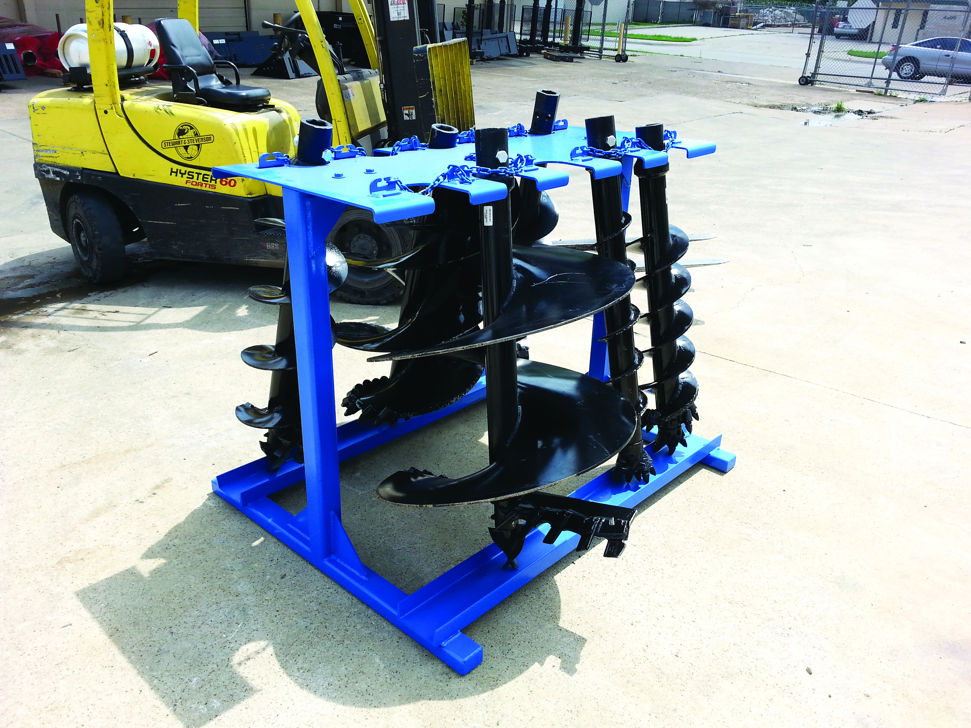 angled view the star industries skid steer auger rack
