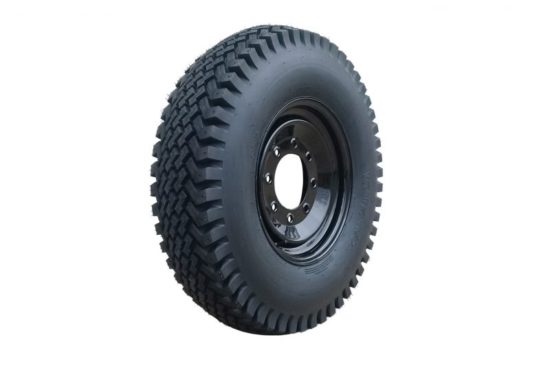 white background product photo of blue diamond skid steer snow tires