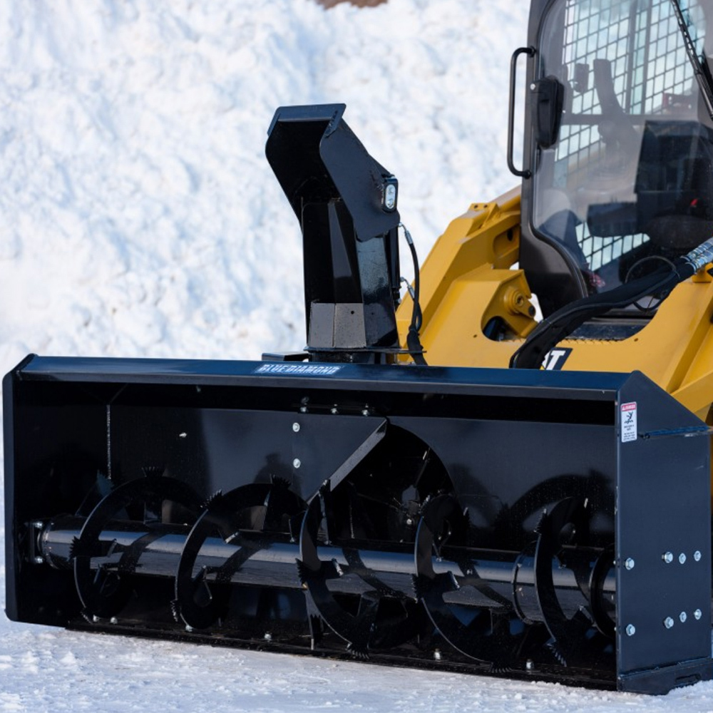 right angled closeup view of a blue diamond skid steer snow blower attachment