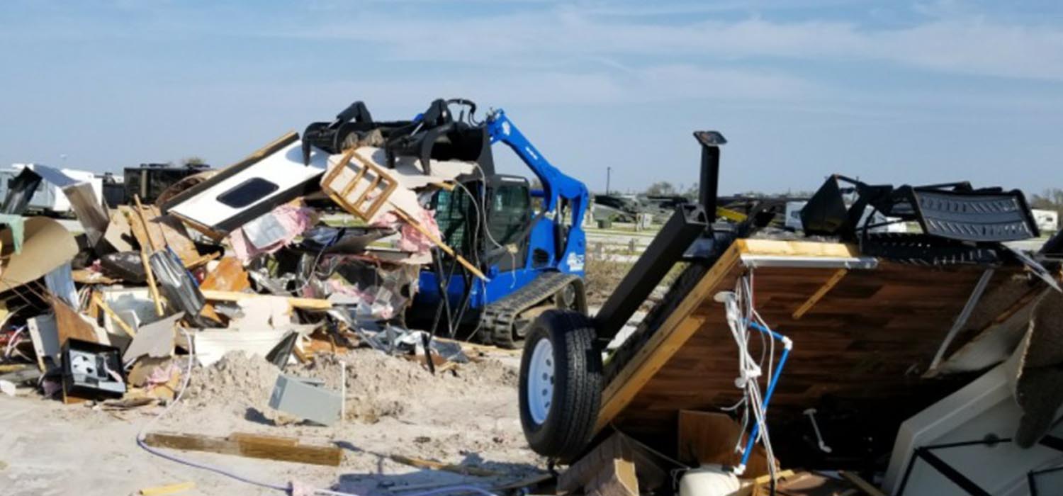 Blue Diamond Assist skid steer on Hurricane Harvey cleanup site