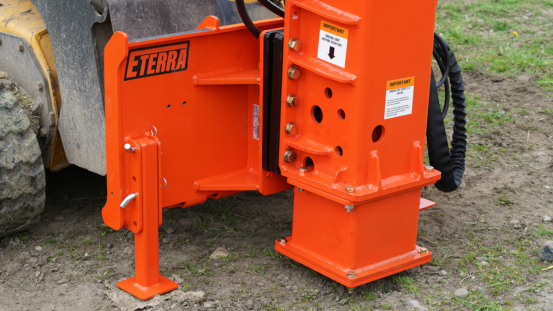 closeup view of an eterra pdx-1000 skid steer breaker style post driver attachment driver head